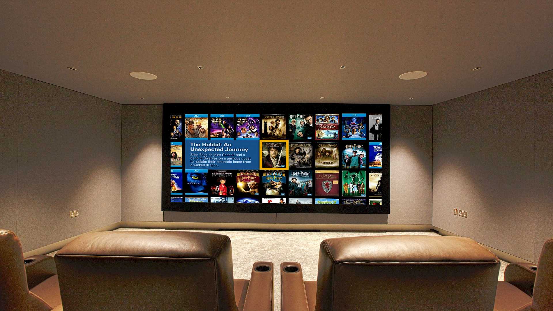 Home cinema room with immersive audio, Trinnov processing and Bowers and Wilkins in wall loudpseakers. Looking at screen from seating position.