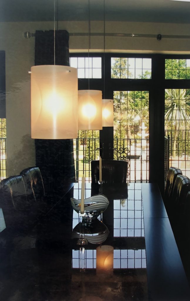 Elegant smart lighting for dining room, showing fittings above dining table