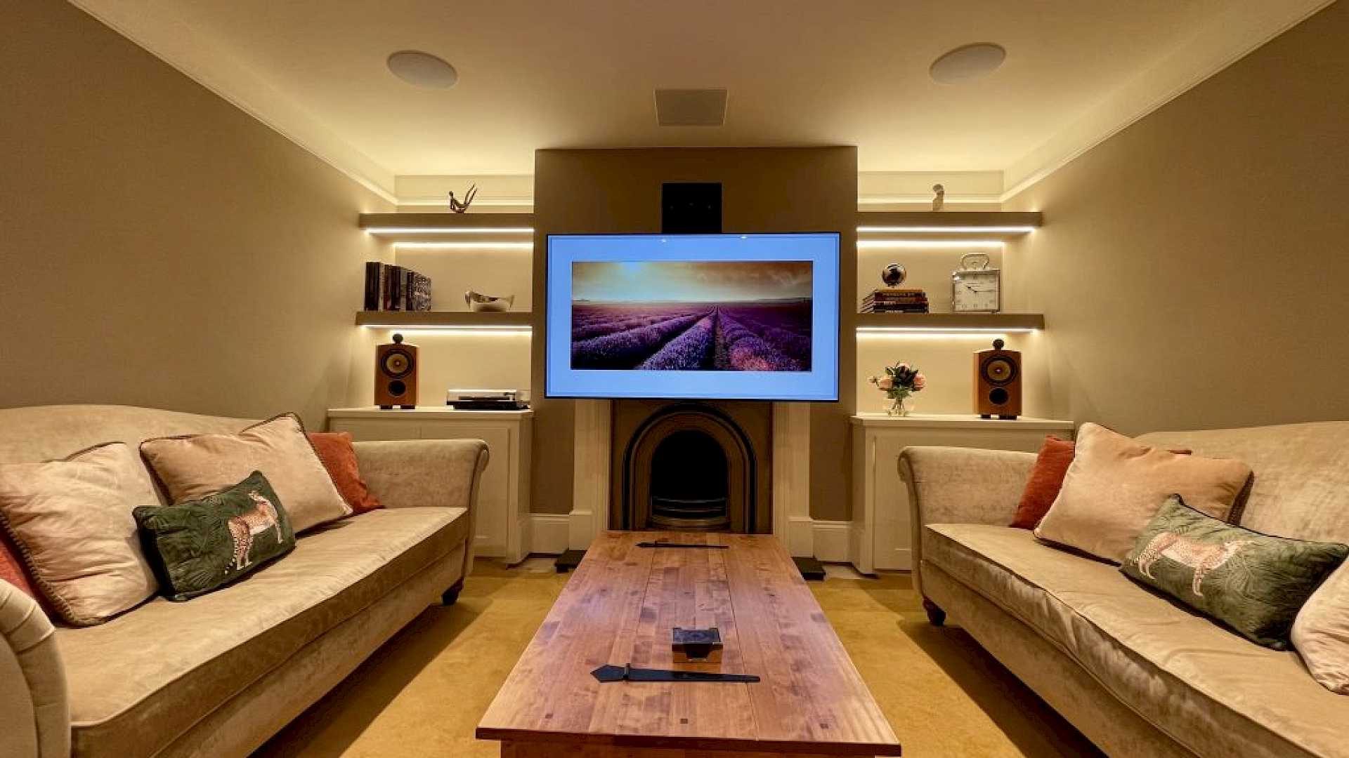 Motorised Art Screen TV bracket, motors the screen to a comfortable viewing height.