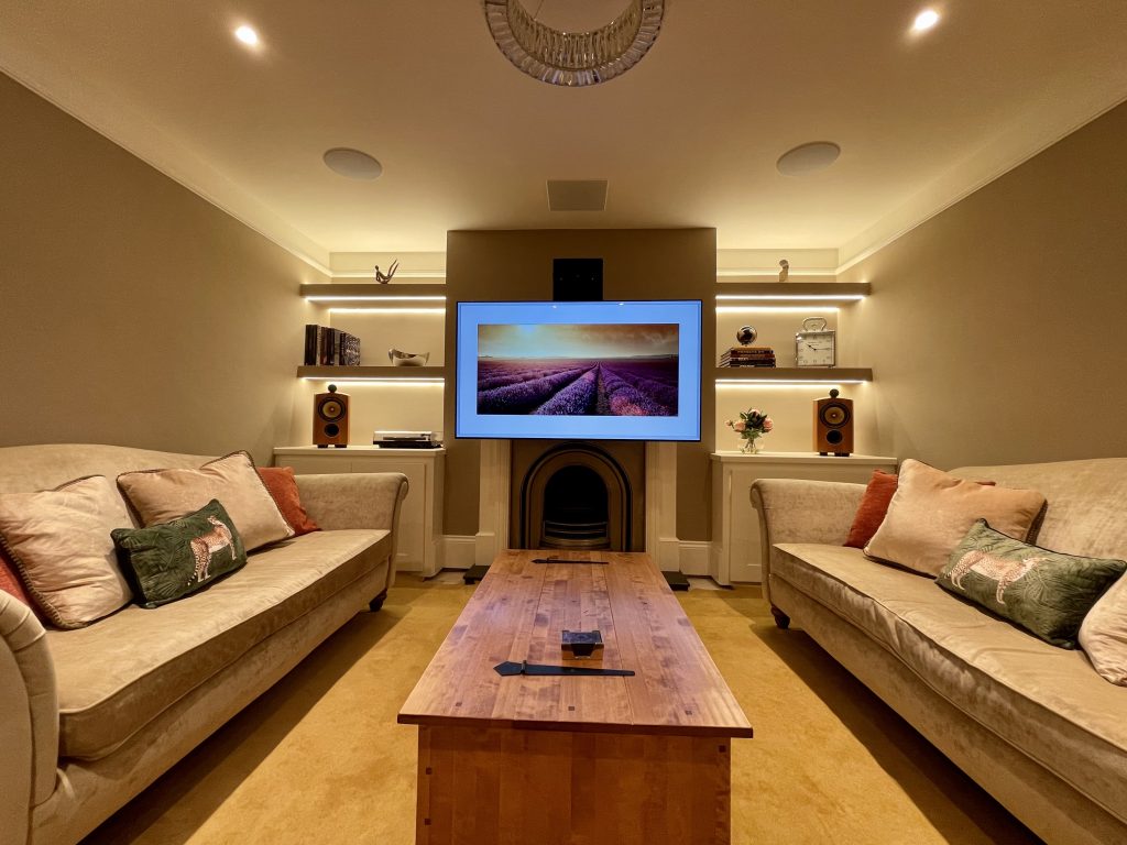 Motorised Art Screen TV bracket, motors the screen to a comfortable viewing height.