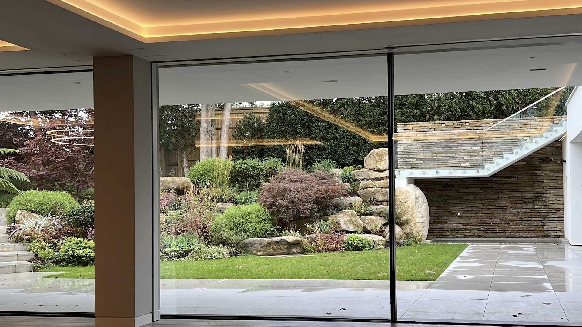 Automated doors, connected to the Lutron intelligent ligthing system.