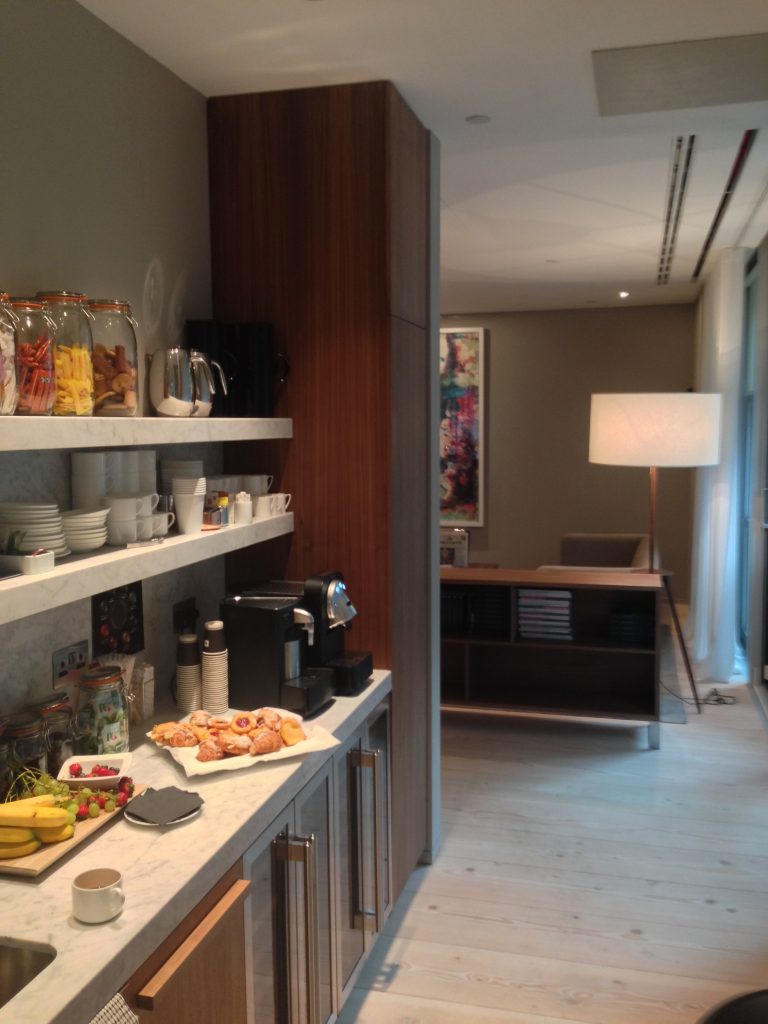 The finished kitchen break out area, with Lutron lighting.