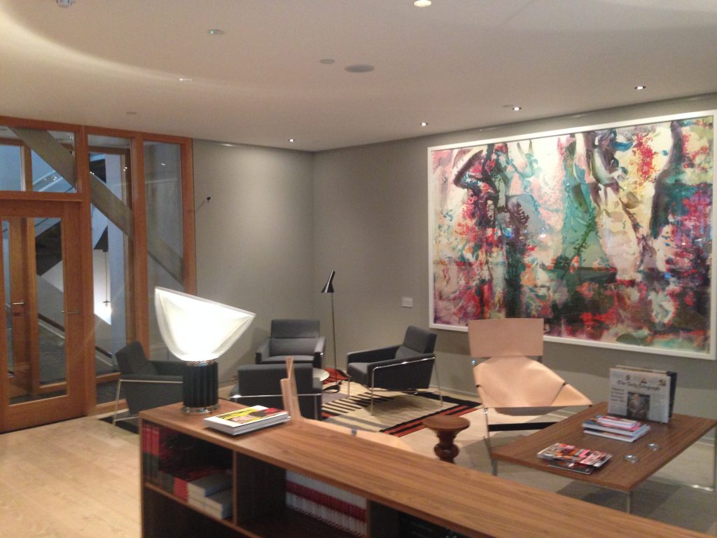Finished reception area with lighting controlled by Lutron Energi Savr Node.