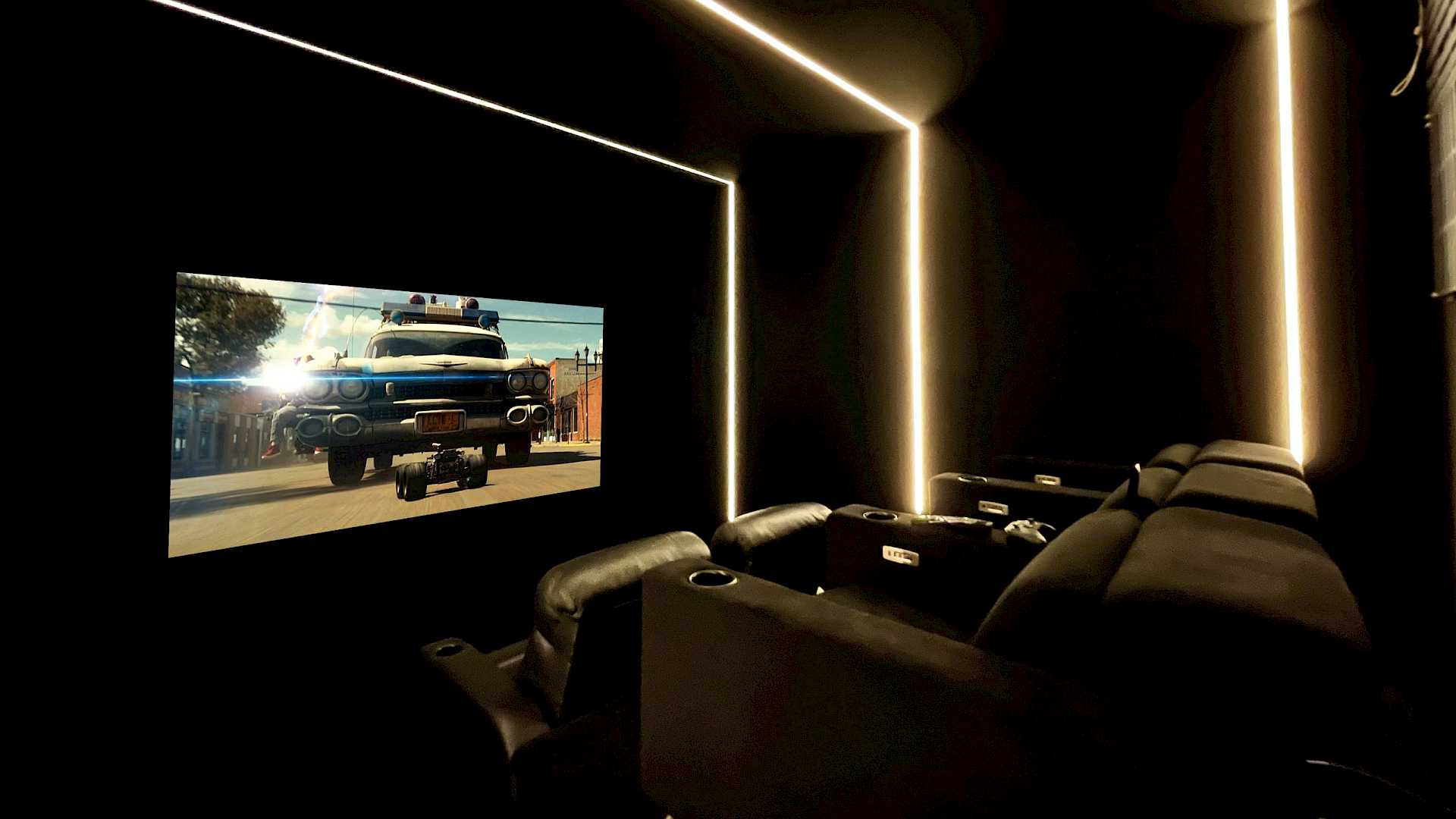 Home cinema from side, shows screen and seating.