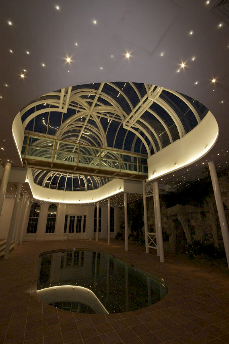 Winter garden lighting showing star lights - Winner of Best Lighting Design