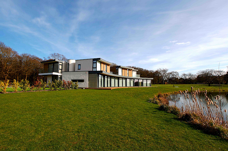 Lutron shades installed in this Kent home, protecting the owner's privacy, security and possessions.