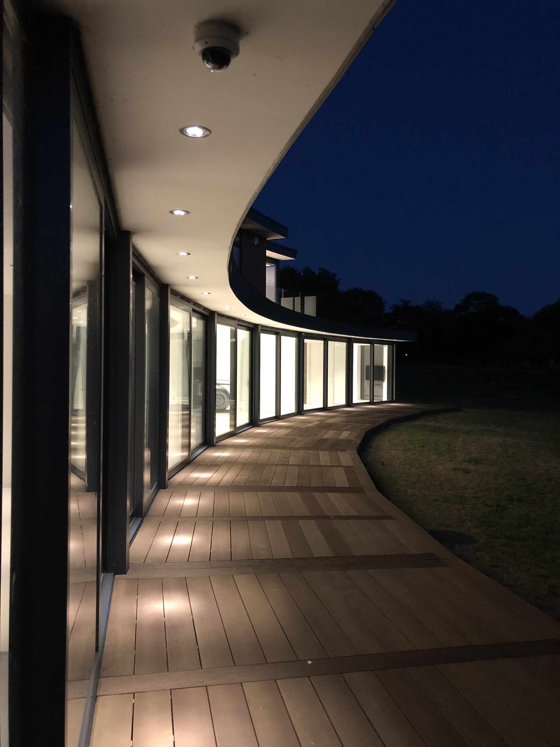Outside lights creating pathway. Lighting contol is an important part of home automation.