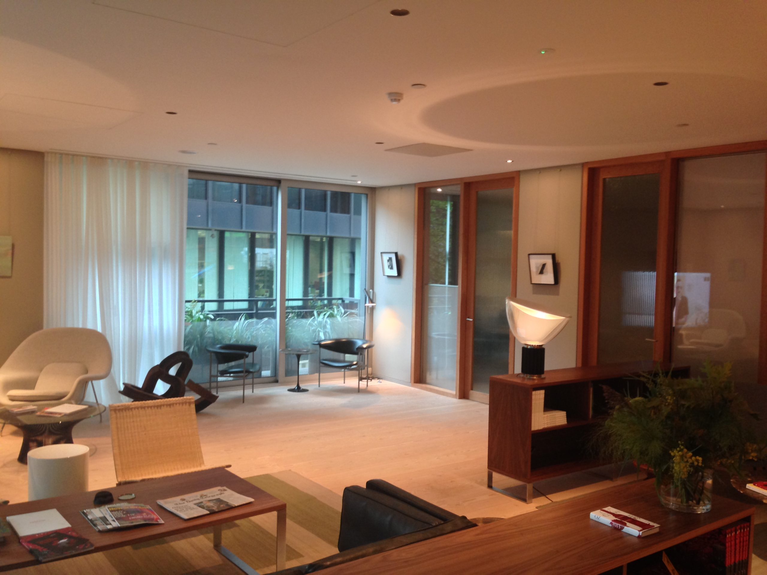 The finished reception area and meeting rooms with Lutron Energi Savr Node Lighting