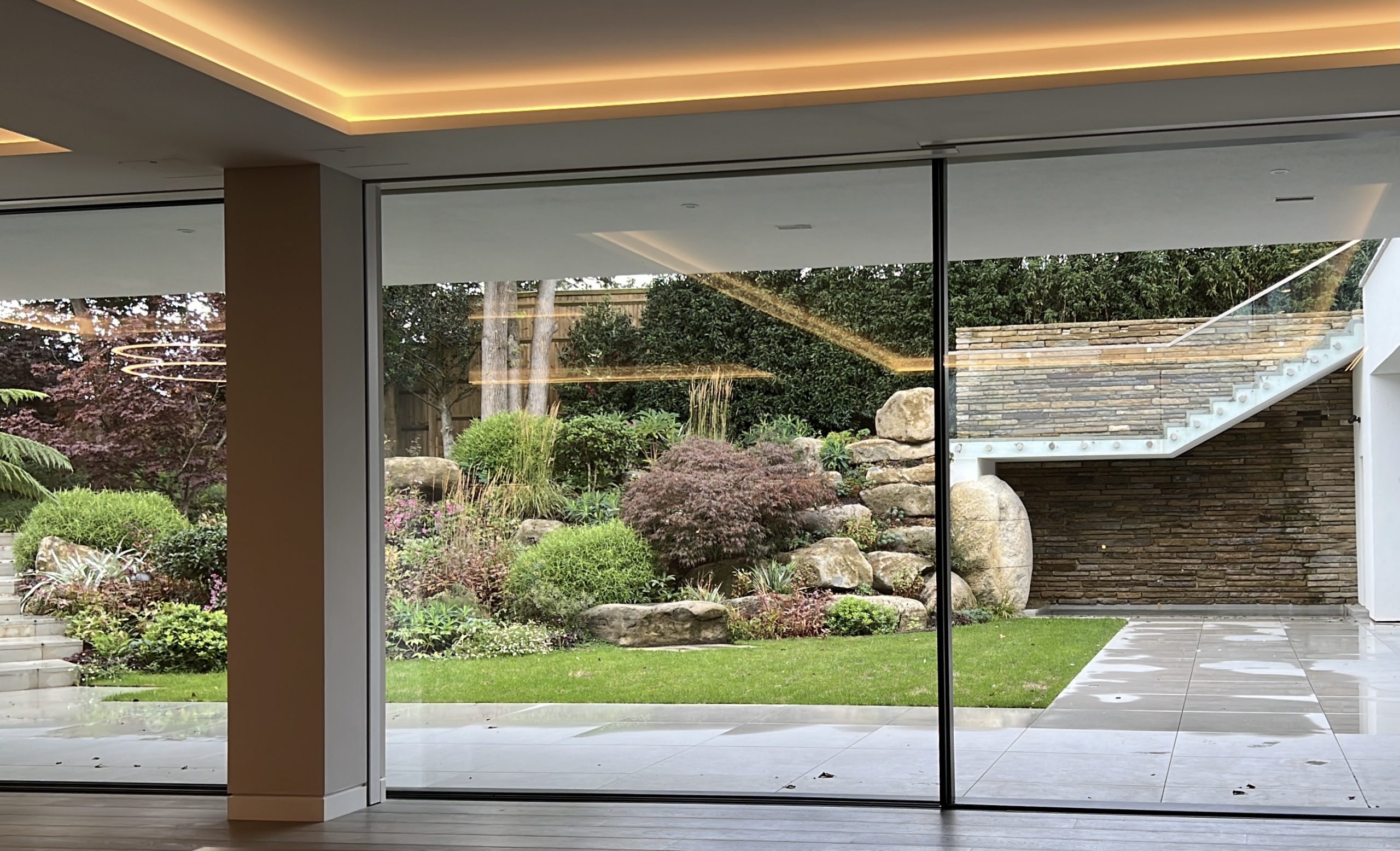Automated doors, connected to the Lutron intelligent ligthing system.