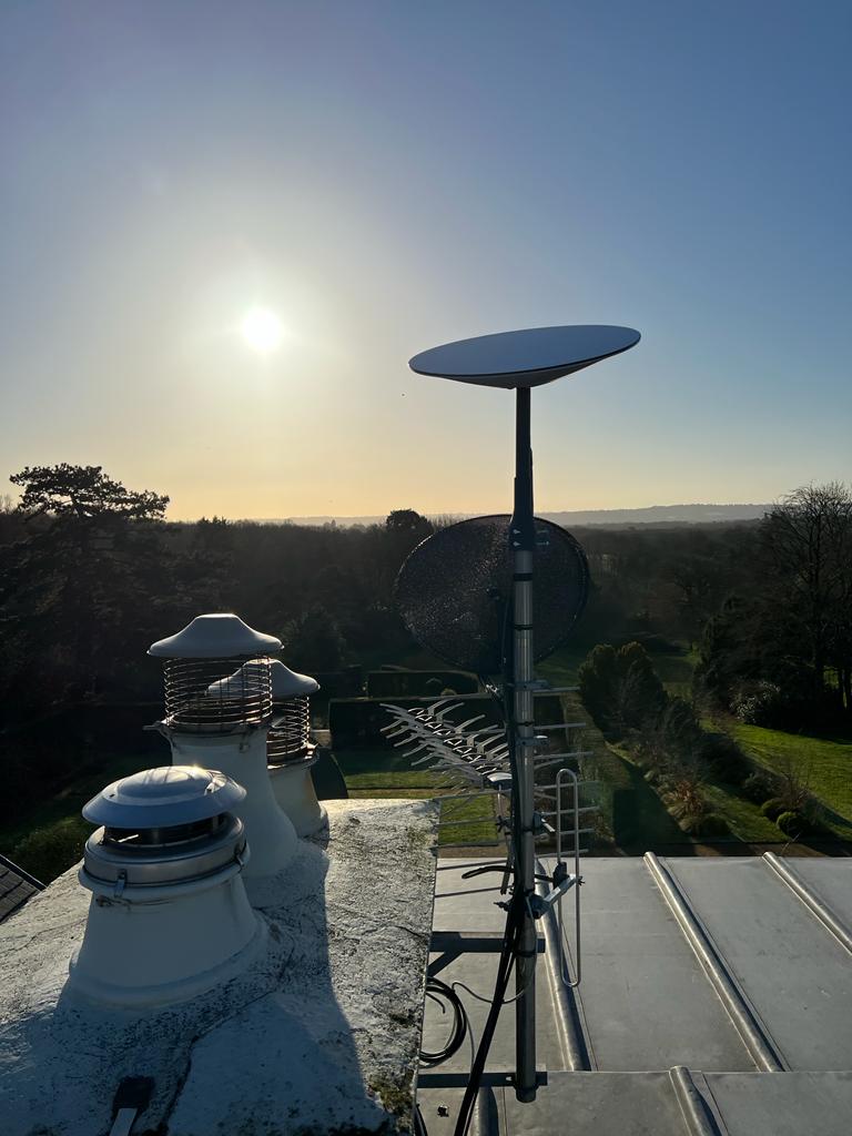 Image shows the install of a Starlink statellite dish, which provides broadband for this rural home in Kent.